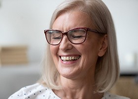 Smiling older woman with glasses 