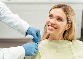 Female dental patient smiling